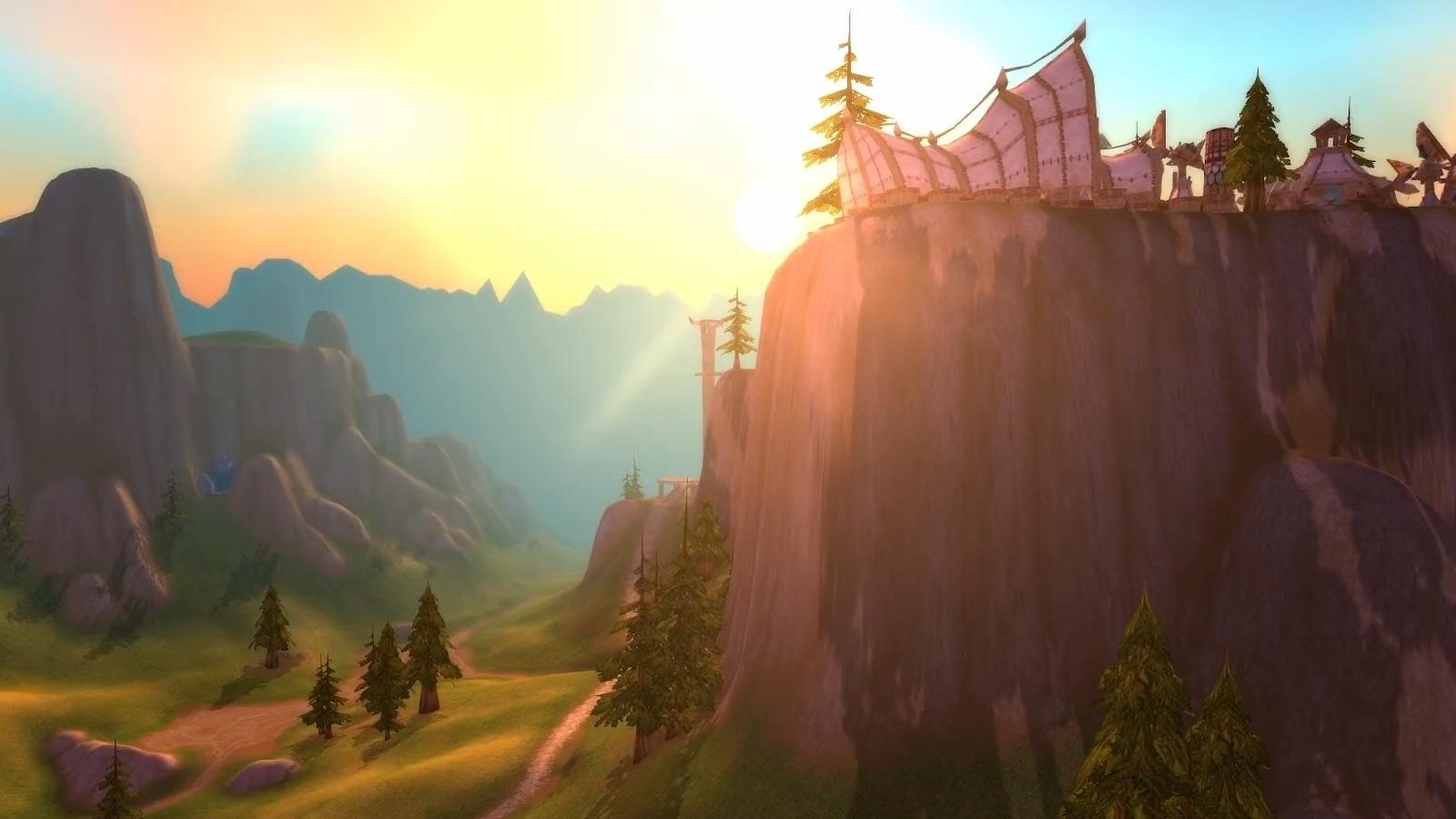 Mulgore — Mulgore mesa with tauren structures: the mountain now casts shadows and light shafts through the haze. — Classic