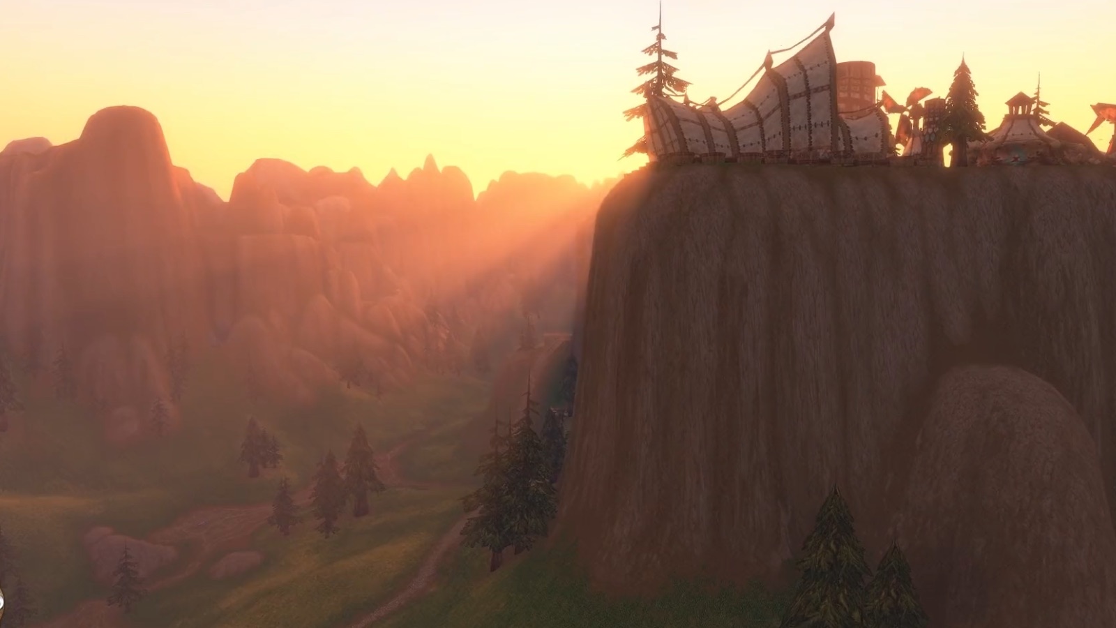Mulgore — Meseta de Mulgore con construcciones tauren: la montaña proyecta ahora sombras y rayos de luz sobre la bruma. — Forever