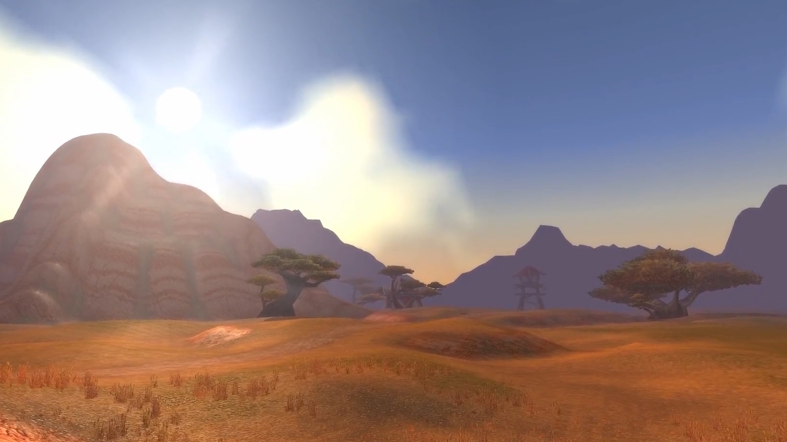 Los Baldíos — Sabana de Los Baldíos con torre de vigía: el cielo azul plano de Classic frente a la luz y la bruma de Forever. — Classic